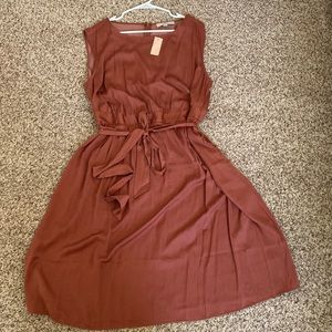 Elegant rust color dress,never worn. Perfect for summer weddings/outdoor events.